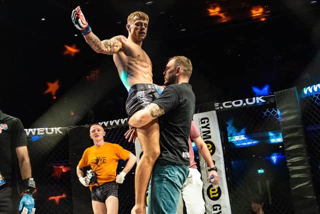 Cameron Hardy celebrates his win at Shock N Awe 28 - with team-mate Elliott Hoye in the background. Picture: Vernon Nash