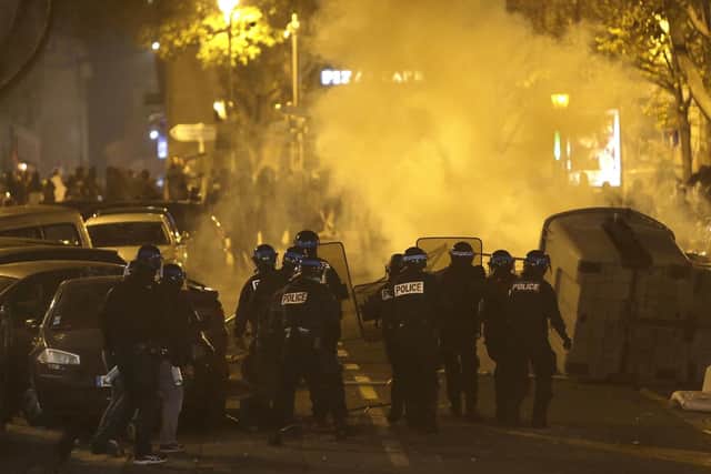 Police face demonstrators in Marseille during the 'gilets jaune' riots. Picture: AP Photo/Claude Paris