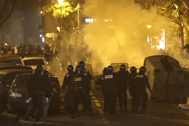 Police face demonstrators in Marseille during the 'gilets jaune' riots. Picture: AP Photo/Claude Paris
