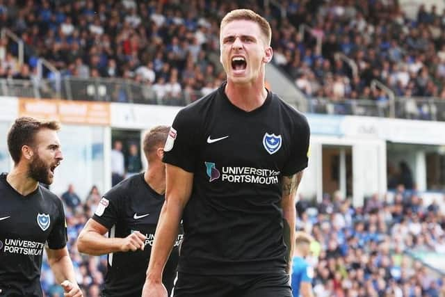 Oli Hawkins celebrates his opener at Peterborough. Picture: Joe Pepler