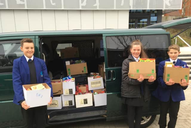 Swanmore College pupils delivering food parcels to the food bank