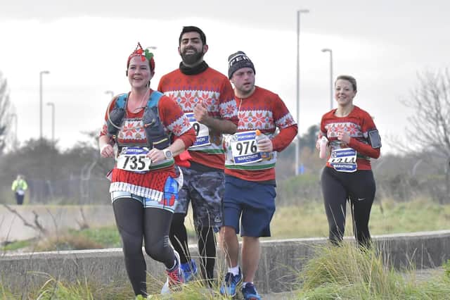 The Portsmouth Coastal Marathon returns on Sunday - there is always a good festive feel to the event. Picture: Neil Marshall (171350-24)