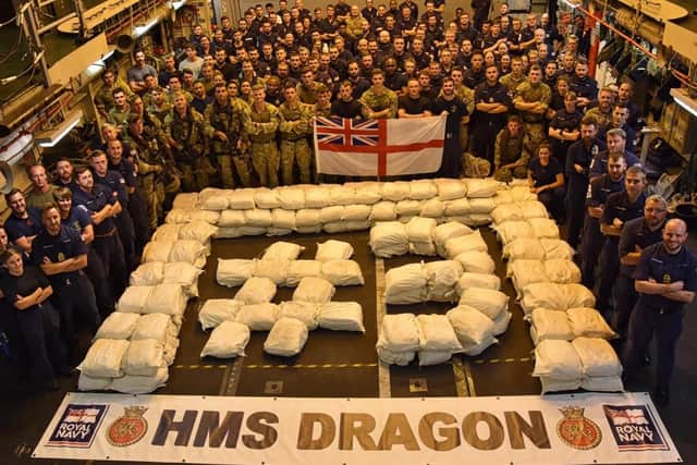 Members of the ship's company of Royal Navy warship HMS Dragon which seized and destroyed ten tonnes of drugs worth more than 75m in one of the most significant drugs busts in the Gulf this year.