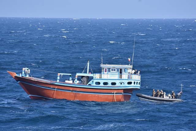 Boarding and painstakingly searching the boats, personnel removed hundreds of sacks of narcotics worth a UK street value of more than 75m