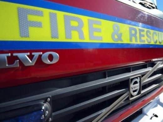 Firefighters were called out to a dumped car on fire
