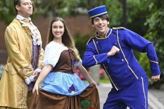 Andy Moss as Prince Charming, Melissa Jane Fleming as Cinderella and Ed Petrie as Buttons are in Cinderella at Ferneham Hall, Fareham. Picture by Malcolm Wells (180912-4866)