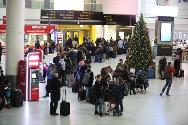 Passengers at Gatwick airport waiting for their flights yesterday following the delays and cancellations brought on by drone sightings near the airfield Picture: Isabel Infantes/PA Wire