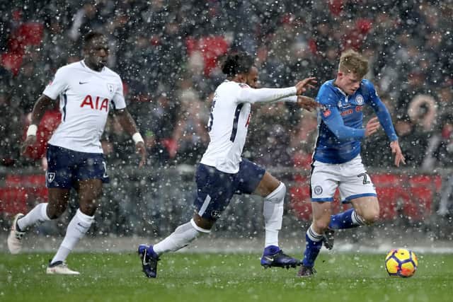 Andy Cannon (right) battles with Spurs' Danny Rose in last season's FA Cup fifth-round replay at Wembley