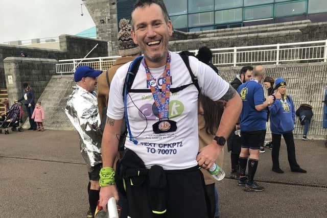Rich Harris at the finish line of the Portsmouth Coastal Marathon 2018