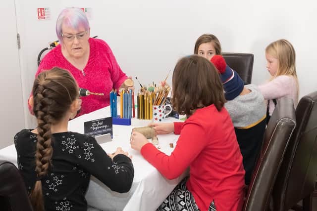 Lesley Calls with some of the children attending Crafty Makery.
Picture Credit: Keith Woodland