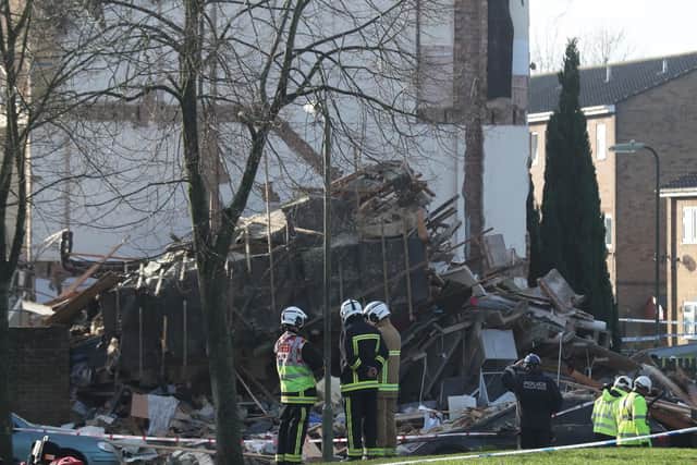 Emergency service personnel in Launcelot Close, Andover, where Hampshire Police say that the body of a man has been found after an explosion caused a building to collapse this morning.Thursday December 27, 2018. Steve Parsons/PA Wire