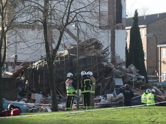 Emergency service personnel in Launcelot Close, Andover, where Hampshire Police say that the body of a man has been found after an explosion caused a building to collapse this morning.Thursday December 27, 2018. Steve Parsons/PA Wire