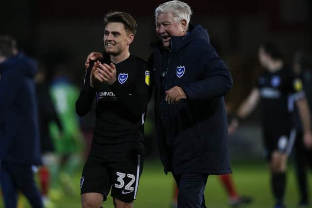 Man of the Match Ben Thompson celebrates with Barry Harris following another away victory. Picture: Daniel Chesterton/phcimages.com