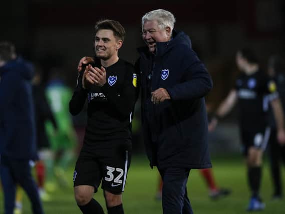 Man of the Match Ben Thompson celebrates with Barry Harris following another away victory. Picture: Daniel Chesterton/phcimages.com