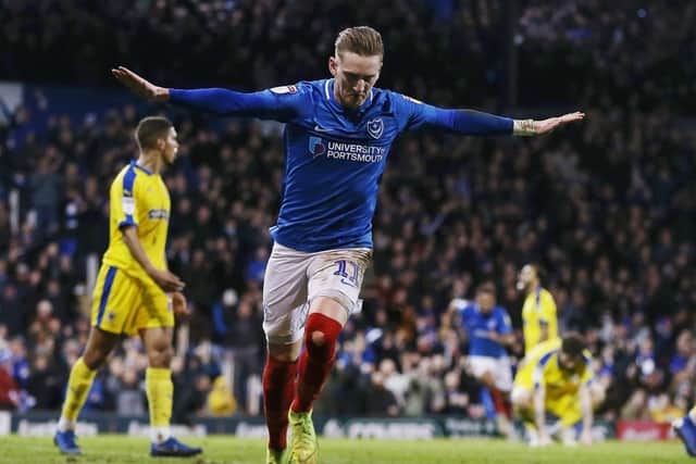 Ronan Curtis celebrates his late winner for Pompey against AFC Wimbledon. Picture: Joe Pepler