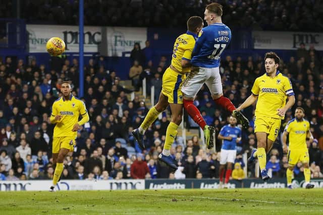Ronan Curtis headed home Pompey's winner against AFC Wimbledon. Picture: Joe Pepler/Digital South