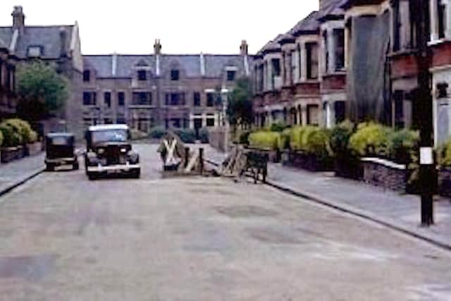 A scene from The Cockleshell Heroes but where? This is believed to be a street in Portsmouth. Anyone recognise it?