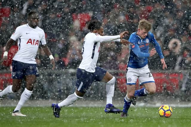 Tottenham Hotspur's Danny Rose battles Andy Cannon for the ball. Picture: Nick Potts/ PA Images