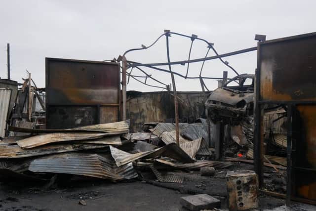 Damage left to the car workshop, including a Ford RS2000
.Picture: Habibur Rahman