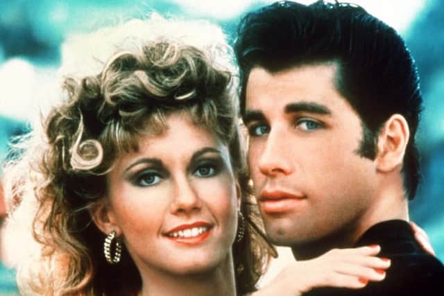 A still from the 1978 film Grease starring Olivia Newton John as Sandy and John Travolta as Danny.