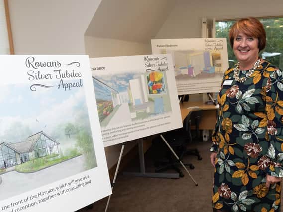 Rowans Hospice chief executive Ruth White with artists' impressions of how the building will be transformed      Picture: Vernon Nash (180678-006)