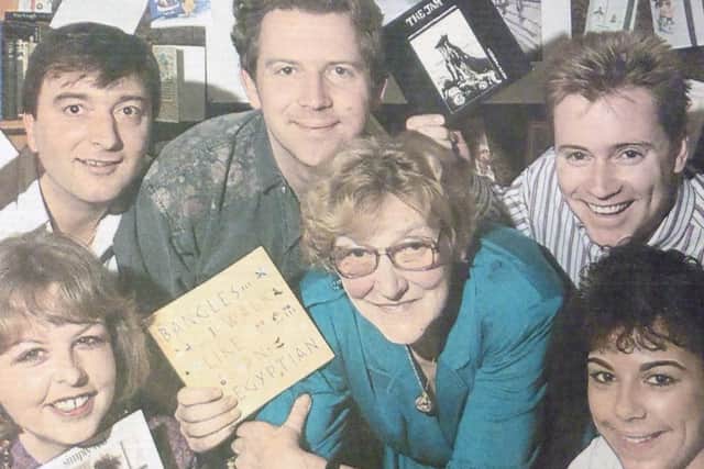 Maisie Adams, centre, is presented with money raised by Mark Radford and friends. From left: Judy Hanlow, Philip young people in this world.'  Bates, Mark Redford, Lester Russell and Lisa Russell.