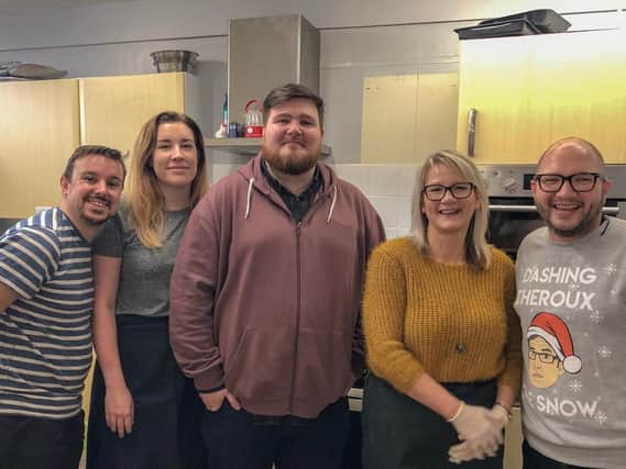 Investment management firm Brooks Macdonald helped out at The Lifehouse in Portsmouth. Picture is James Place, Chelsea Sturgess, Jon Keates, Sally Spicer and Russell Leggatt.