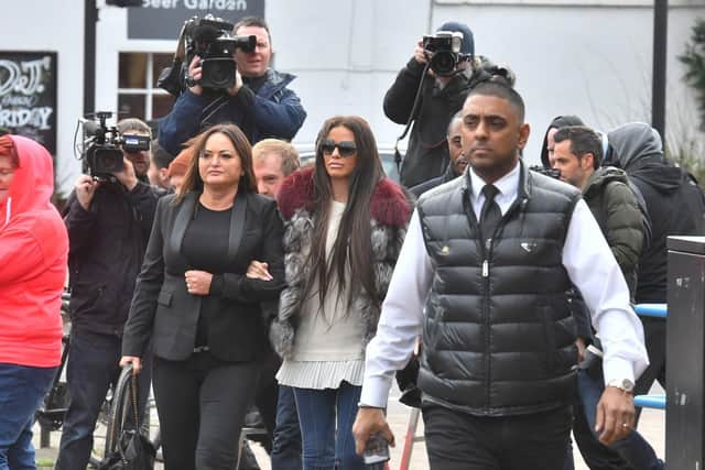 Katie Price (centre) leaves Bromley Magistrates' Court where she appeared charged with being drunk in charge of a motor vehicle following her arrest on October 10 last year. Picture: John Stillwell/PA Wire