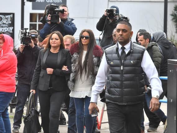 Katie Price (centre) leaves Bromley Magistrates' Court where she appeared charged with being drunk in charge of a motor vehicle following her arrest on October 10 last year. Picture: John Stillwell/PA Wire
