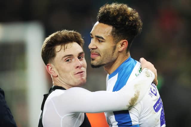 Ben Thompson congratulates match-winner Andre Green at Norwich on Saturday Picture: Joe Pepler