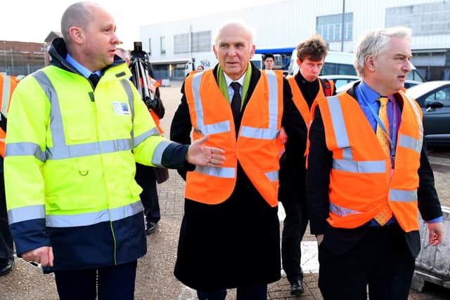 Sir Vince Cable, centre, with Councillor Gerald Vernon-Jackson, Leader of Portsmouth City Council, right, and Mike Sellers, director of Portsmouth International Port.
Picture by: Malcolm Wells (190108-1862)
