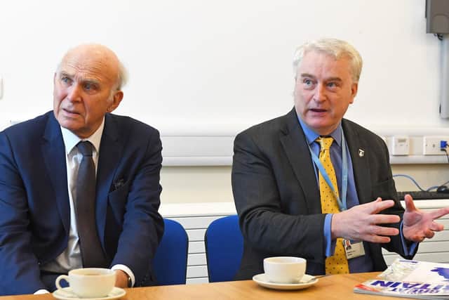 Sir Vince Cable, Lib Dem leader, left, receiving a briefing about the problems Portsmouth International Port could face if Britain leaves the EU without a deal. Pictured with Councillor Gerald Vernon-Jackson, leader of Portsmouth City Council.
Picture by:  Malcolm Wells (190108-1821)