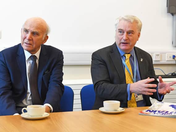 Sir Vince Cable, Lib Dem leader, left, receiving a briefing about the problems Portsmouth International Port could face if Britain leaves the EU without a deal. Pictured with Councillor Gerald Vernon-Jackson, leader of Portsmouth City Council.
Picture by:  Malcolm Wells (190108-1821)