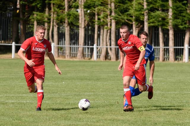Alfie Lis, right, scored for Horndean. Picture: Duncan Shepherd