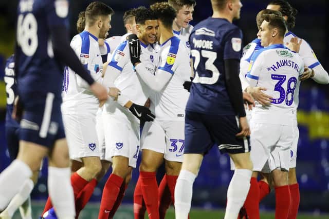 Pompey need to be celebrating again tomorrow to keep hopes of automatic promotion alive. Picture: Joe Pepler