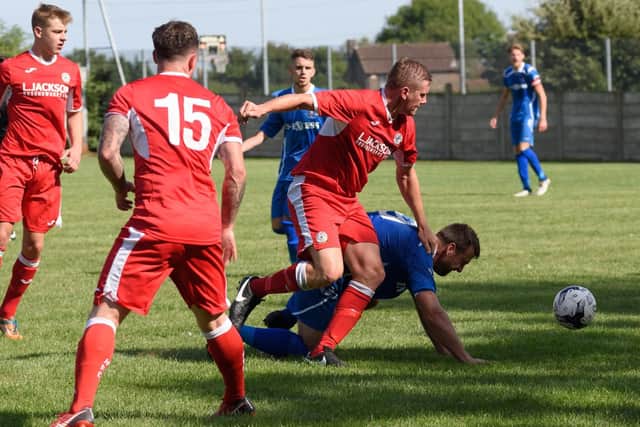 Horndean enjoyed their derby day against AFC Portchester. Picture: Duncan Shepherd