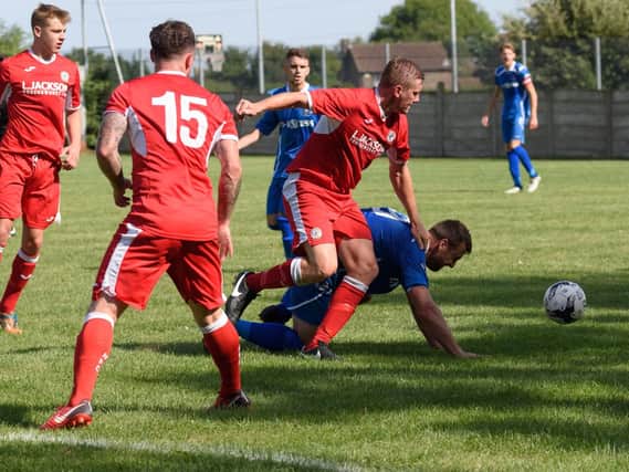 Horndean enjoyed their derby day against AFC Portchester. Picture: Duncan Shepherd