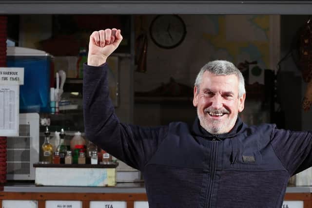 Bim Hartgill celebrates after Portsmouth City Council reversed a decision to not renew his lease at Hartgill Seafoods kiosk, The Hard Picture: Chris Moorhouse (130119-38)