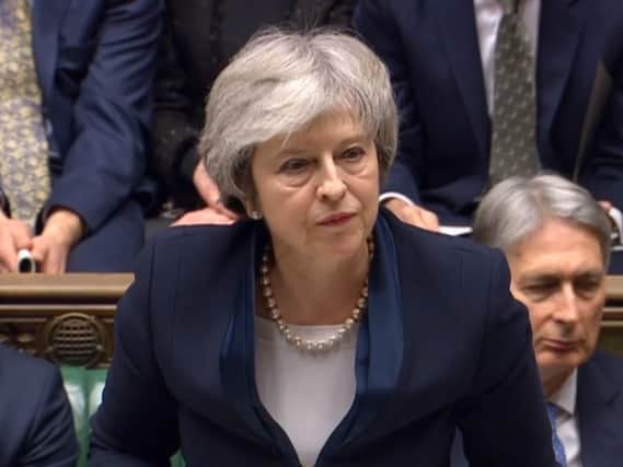 Prime Minister Theresa May speaks after losing a vote on her Brexit deal in the House of Commons, London. Picture: House of Commons/PA Wire