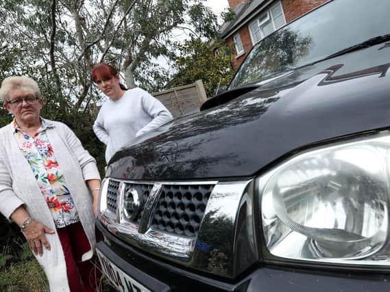 Janice Browning and her daughter Fiona Browning, right, have had a long running dispute with a used car dealer over their Nissan Navara pick-up. Picture by Chris Moorhouse