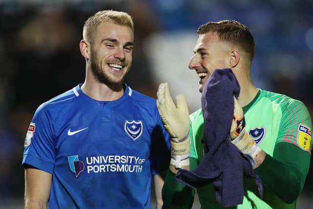 Jack Whatmough, left, with Craig MacGillivray Picture: Joe Pepler