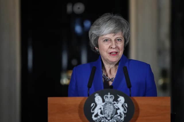 Prime Minister Theresa May speaking outside 10 Downing Street in London after MPs rejected Labour's motion of no confidence