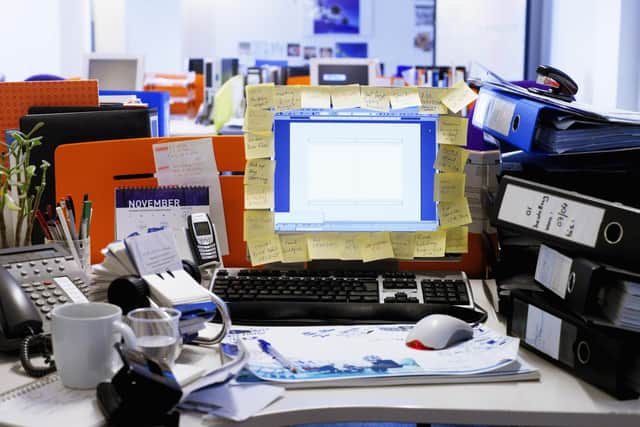 Blaise couldn't care less about his messy desk!