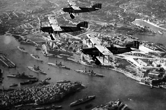 With Royal Navy battleships at anchor in Battleship Row, Grand Harbour, Malta, these pilots had a magnificent view.