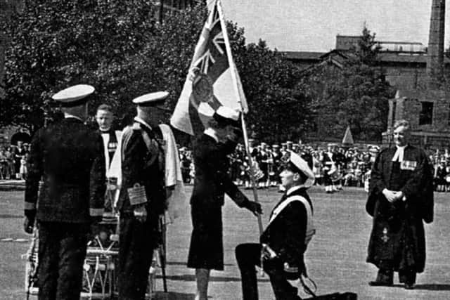 The Duchess of Kent presents the Queens Colour at the Royal Naval Barracks, on May 22, 1952.