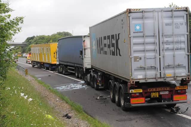 A view of the three lorries invloved in the collision with John Rogers' lorry seen here in the foreground closest to the camera.  Picture: Hampshire Police/Solent News