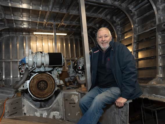 Alan Priddy in the engine house of Excalibur. Picture: Vernon Nash (190119-007)