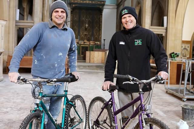 Fran Carabott (left) and Charlie Adie with some of the bikes stored in St Margarets Church, Highland Road, which is being repaired and refurbished after receiving 350,000