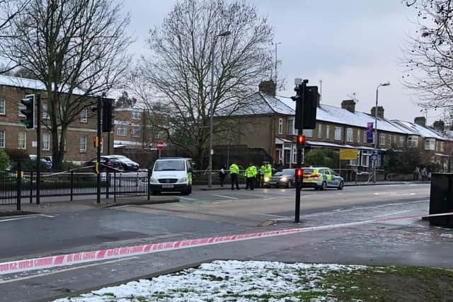 Investigators at work in Forest Road, east London, where a 21-year-old woman has died after being hit by a police car responding to a 999 call. Picture: Carla Johnson/PA Wire
