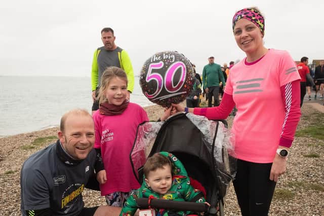Ian, Freya, Sabrina and Evan at Lee-on-the-Solent parkrun. Ian and junior runner Freya joined the 50 parkrun milestone club. Picture: Keith Woodland (190119-192)